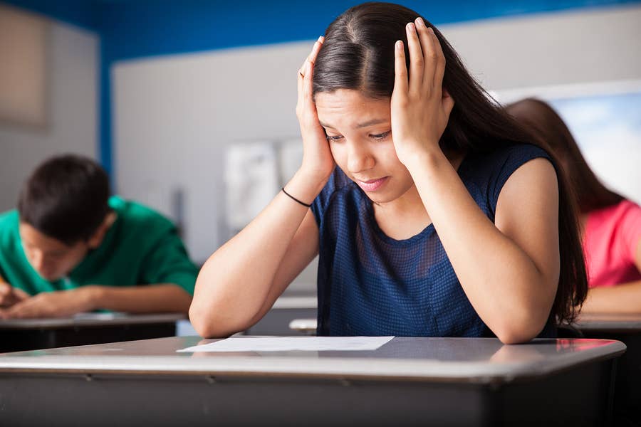 Teen student stressed out during a test for high school