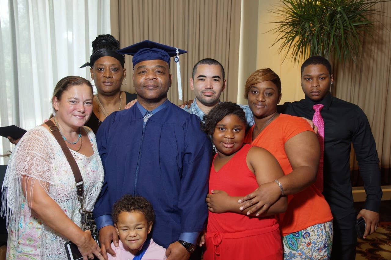 Evans Duvall and his family after graduating from WGU