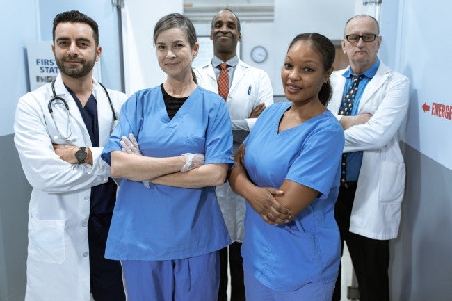 Four nurses looking at camera