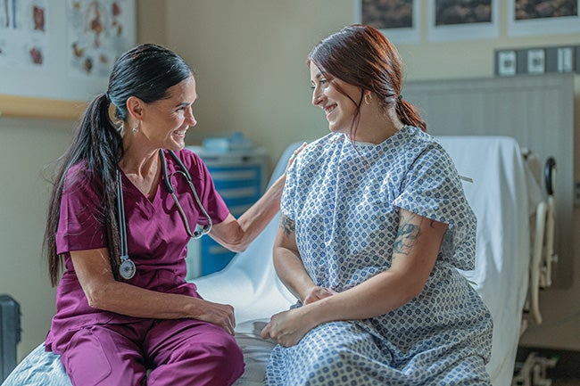 Four nurses looking at camera