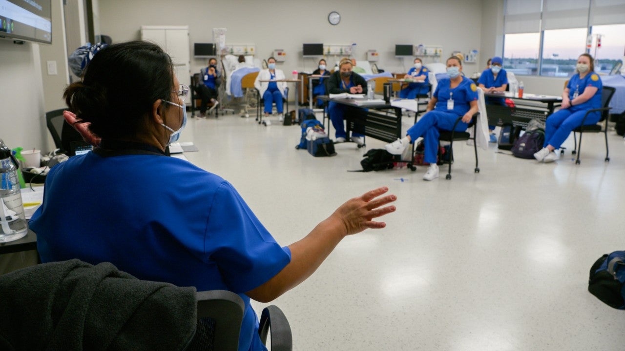 Four nurses looking at camera