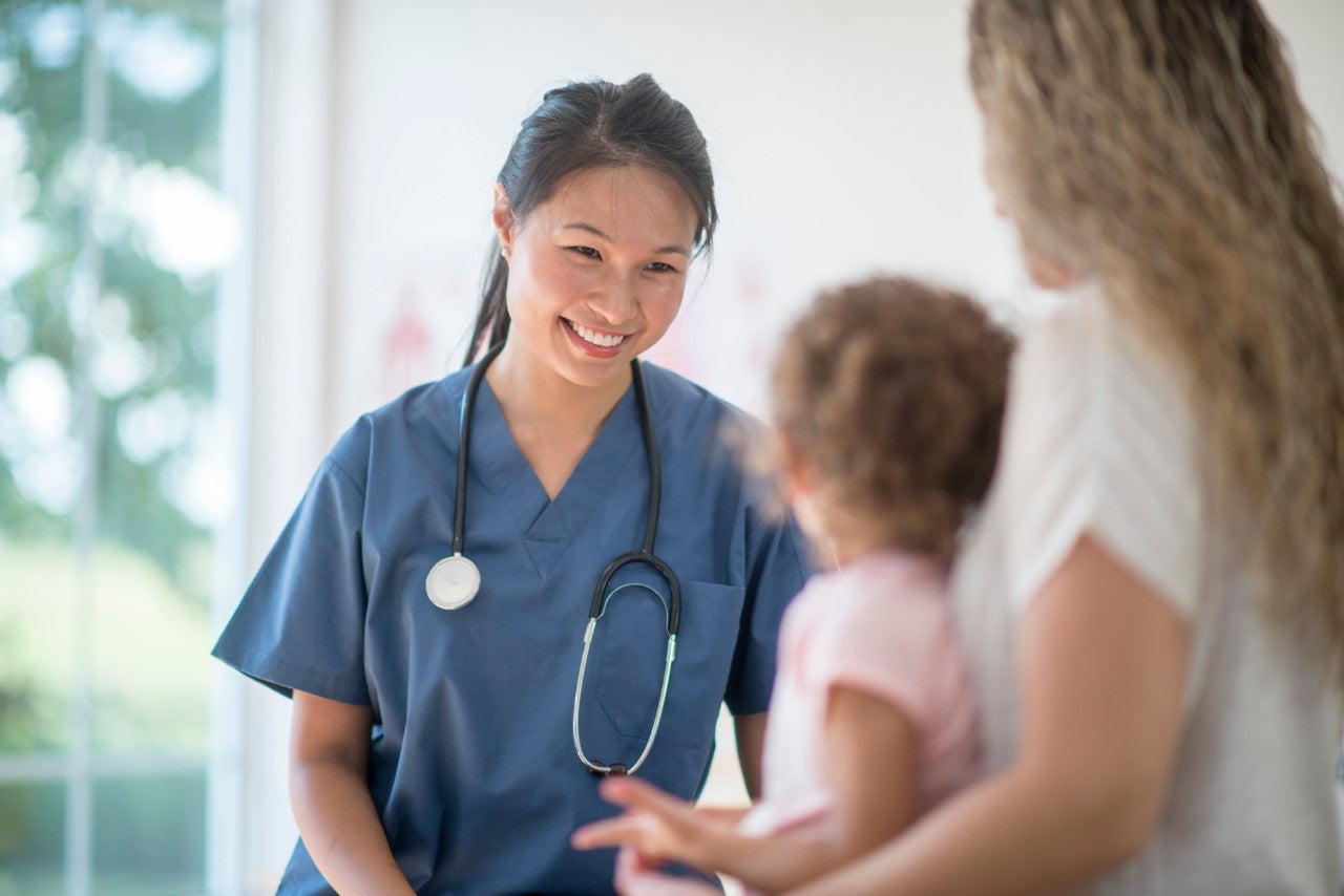 Four nurses looking at camera