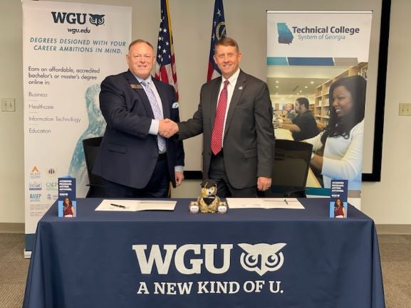 WGU Southeast Regional Director Ben Coulter and TCSG Commissioner Greg Dozier at the partnership signing ceremony in 2022.