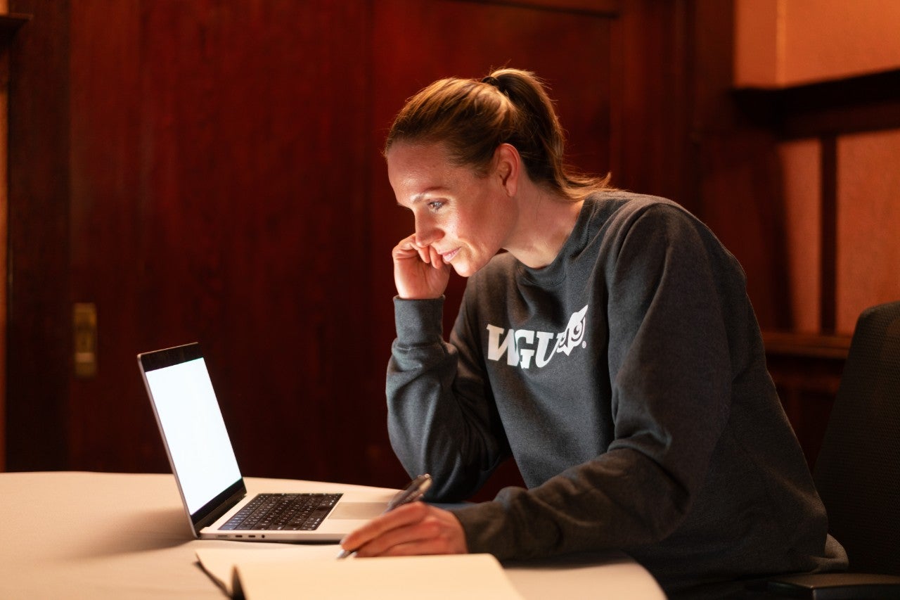 A digital native: child uses a laptop