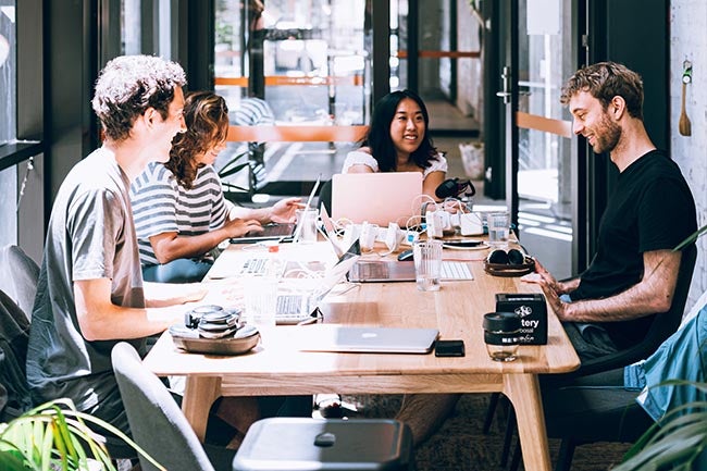 Students at table having meeting