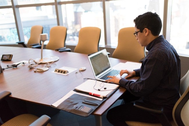 IT Manager typing on computer