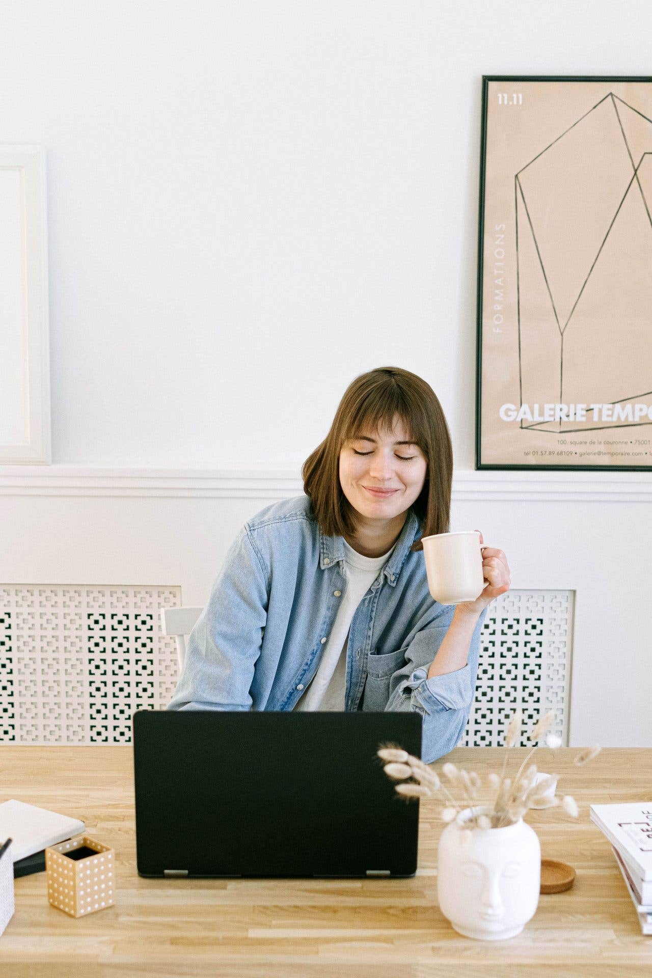 woman smiling while working online