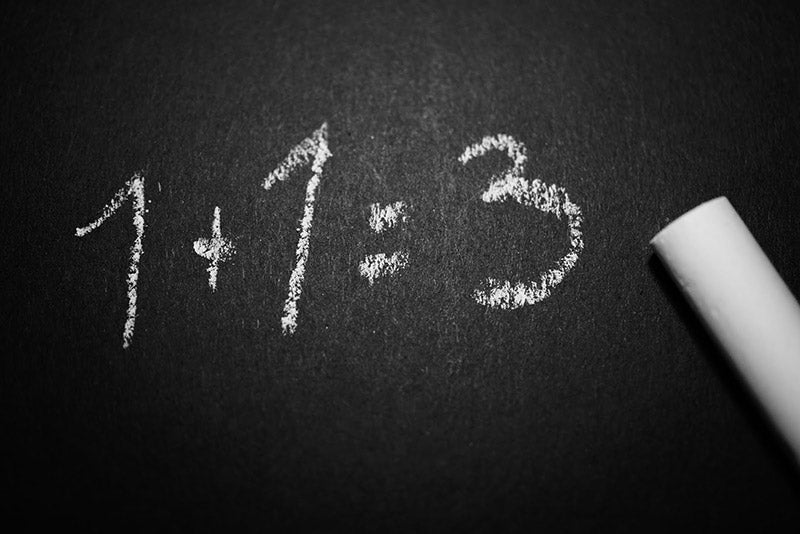 Math teaching on chalkboard