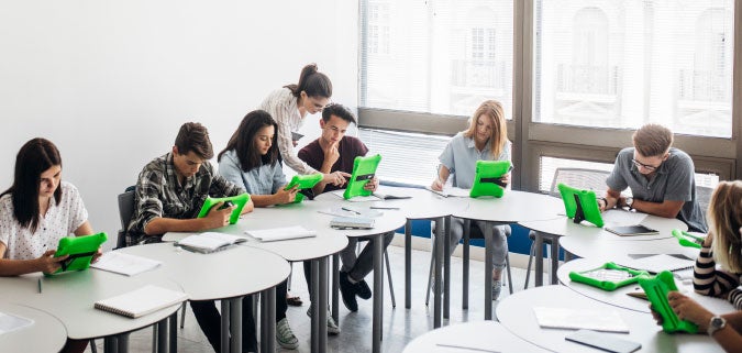 students on tablets