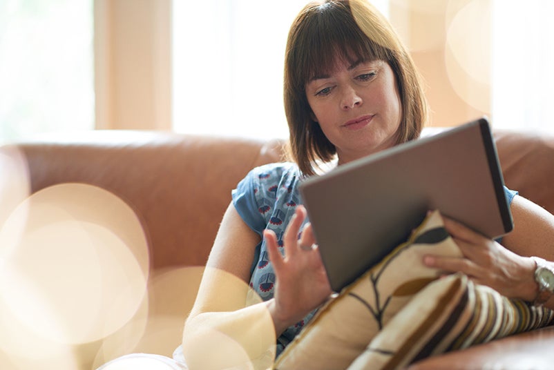 Person browsing tablet