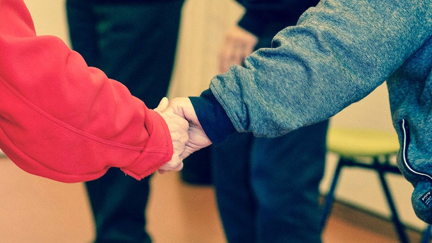 Holding hand to help