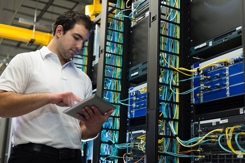 IT guy looking at tablet