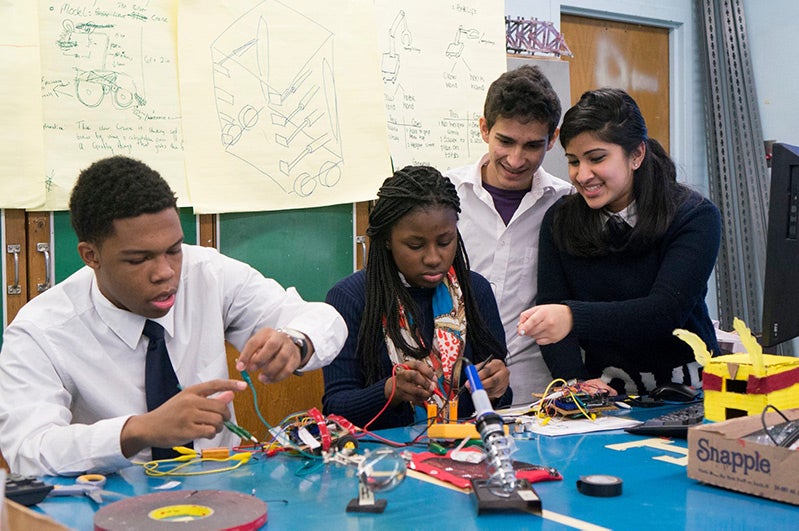 Kids working on science experiments