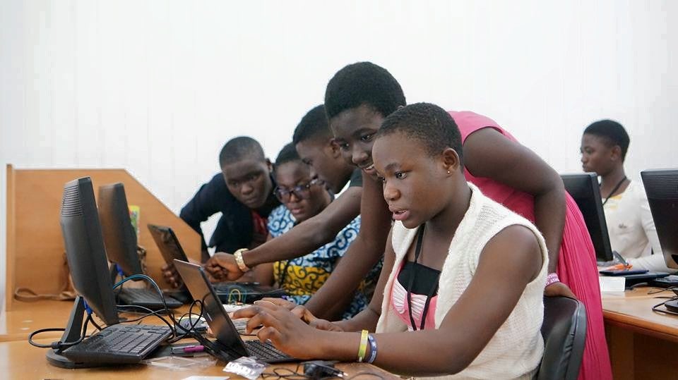 Kids working on desktop computer