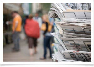Newspaper stand out of focus