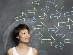 Online student in front of chalkboard
