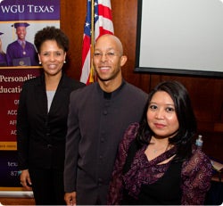 Jason Franklin with graduates, Phylis Boon and Elliette Teague.