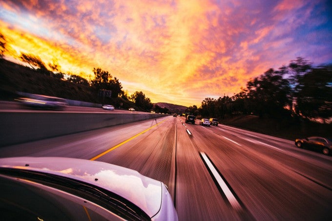 Self-driving car in sunset