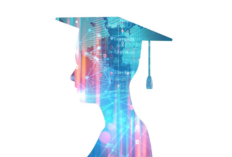 Silhouette of a college graduate with tech imagery