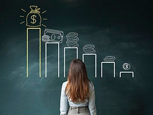 Person standing in front of blackboard