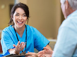 Nurse interacting with a patient