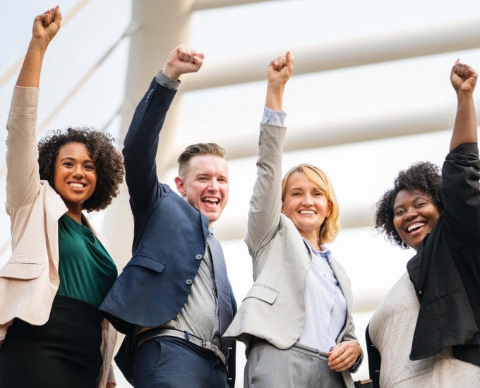 Diverse team celebrating cultural intelligence
