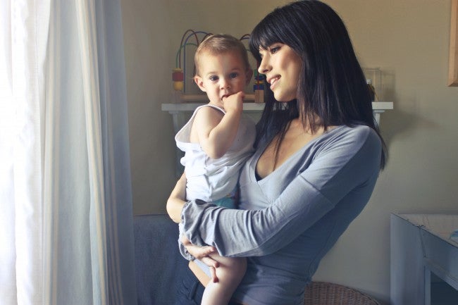 Mom holding little boy