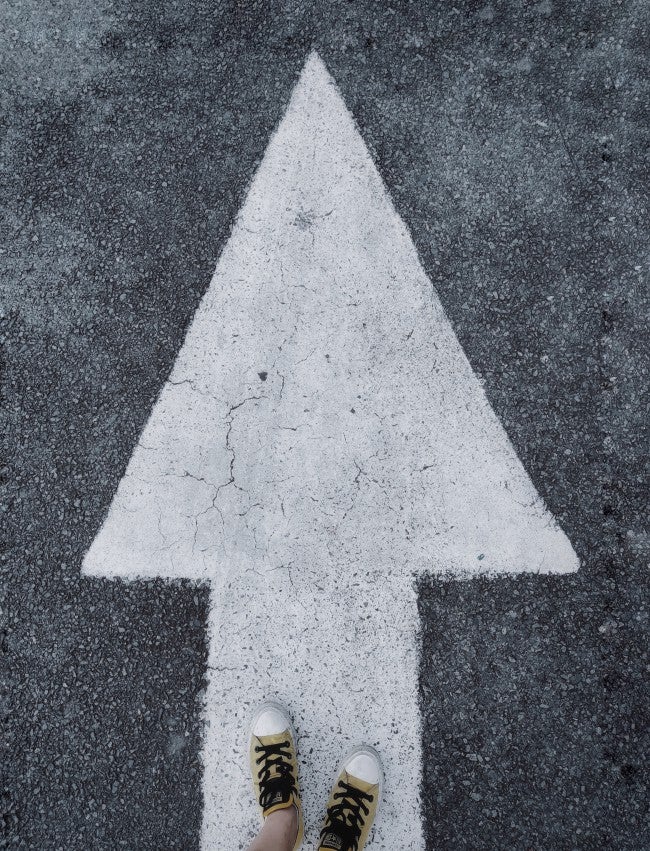 Arrow on asphalt