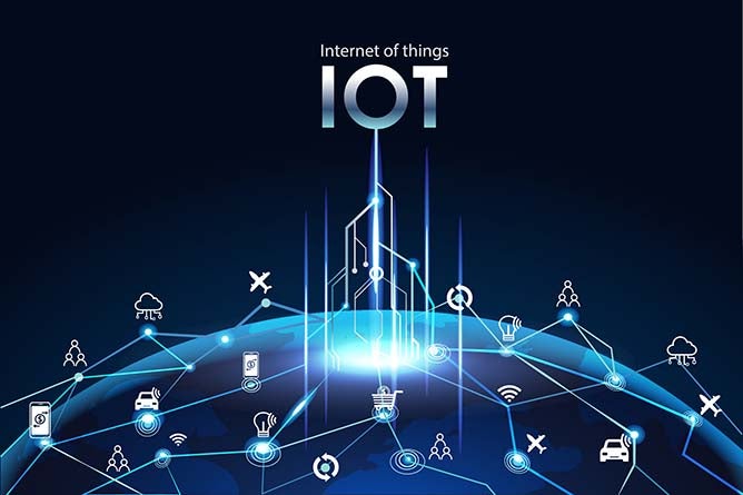 Large texting, reading "IOT" floats above a planet surround by various digital icons.
