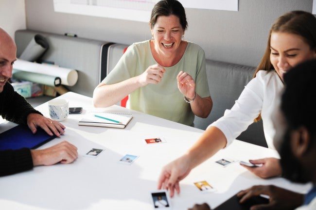 Office workers playing a game