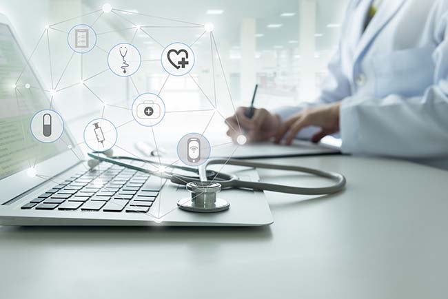 Doctor searching different careers on a computer.