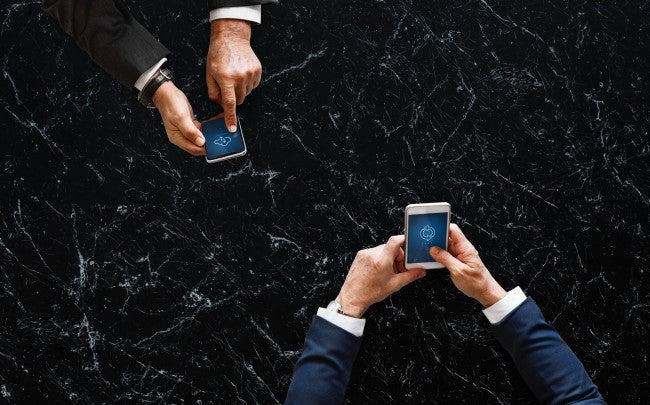 2 hands and phones | computer science degree