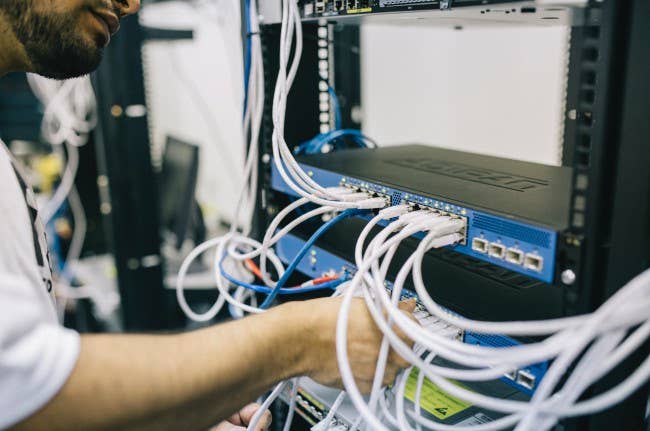 Man working on computer hardware