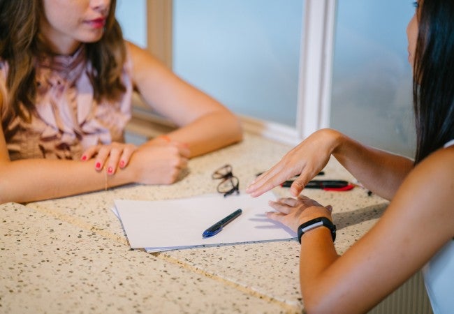 Two women meeting for IT interview