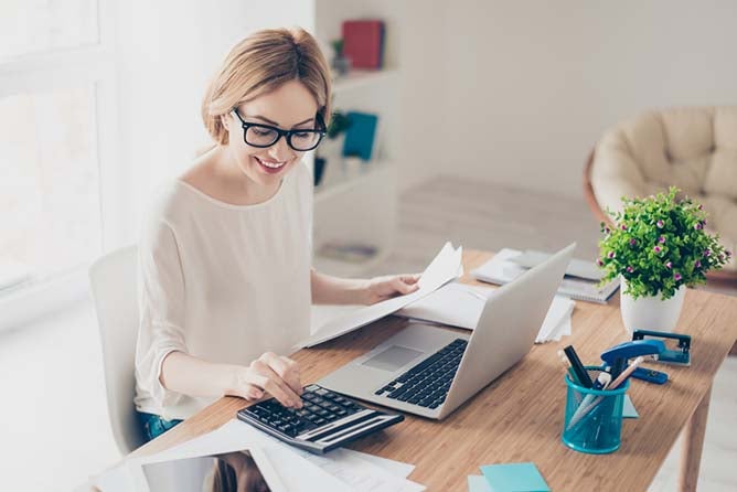 woman helping man at computer hr