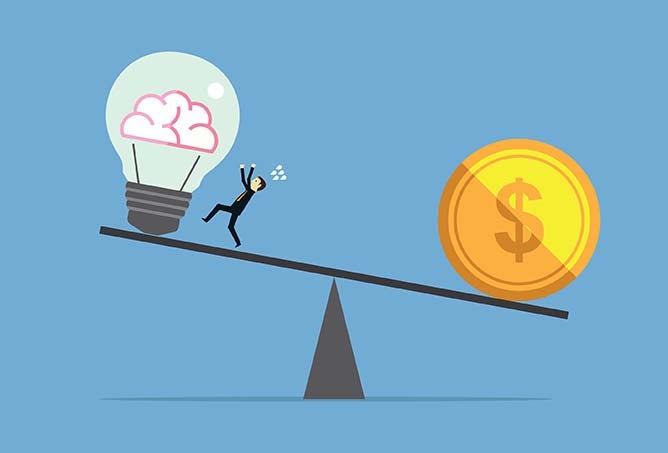 A man on a balancing fulcrum stands between a brain and money