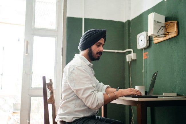 Man sitting at laptop