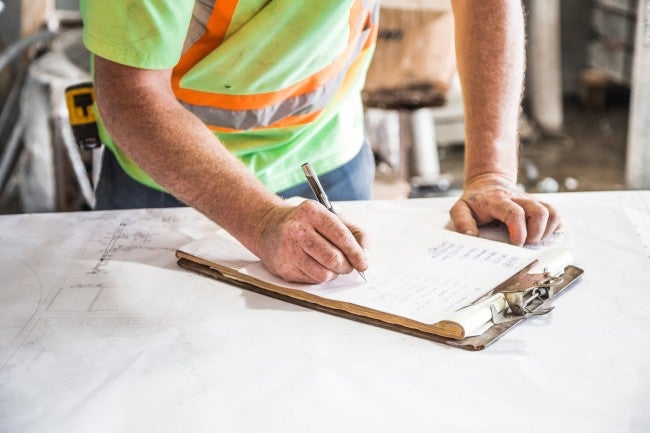 Construction manager working on paperwork