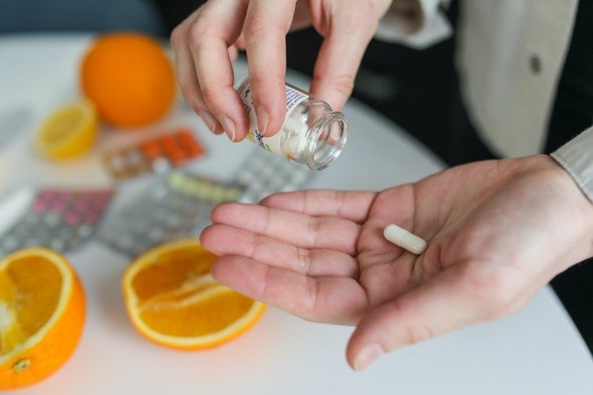 Home nurse preparing pills
