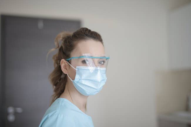 Triage nurse wearing mask