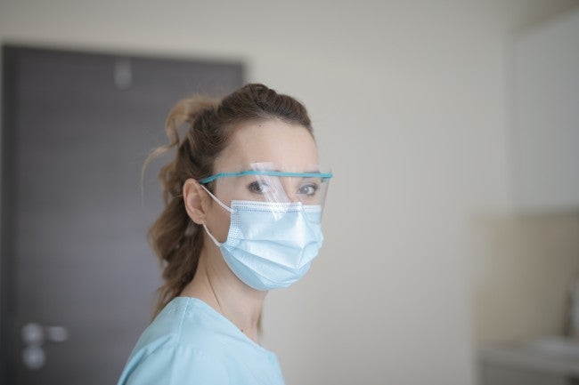 Triage nurse wearing mask