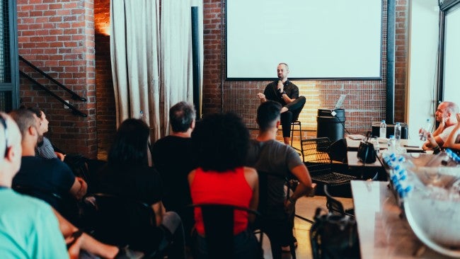 Group of people at a conference | upskill