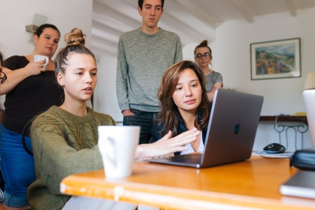 Group looking at computer screen