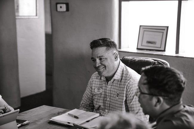 Man in meeting as situational leader
