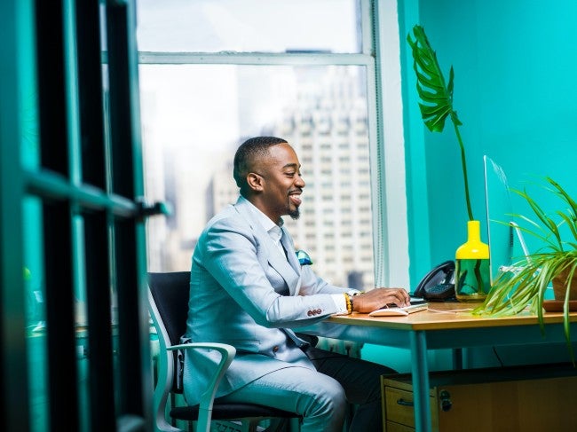 Student in office doing online MBA