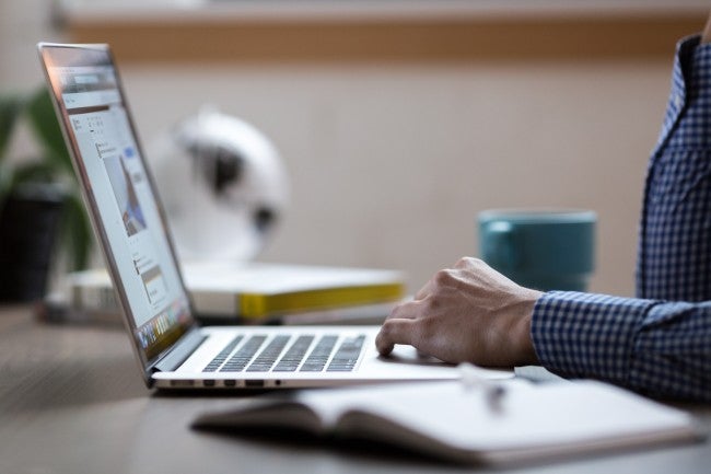 CIO typing on computer