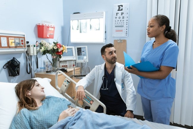 NP and RN visiting a patient
