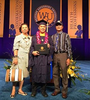 Mark Dimalanta at commencement with his parents