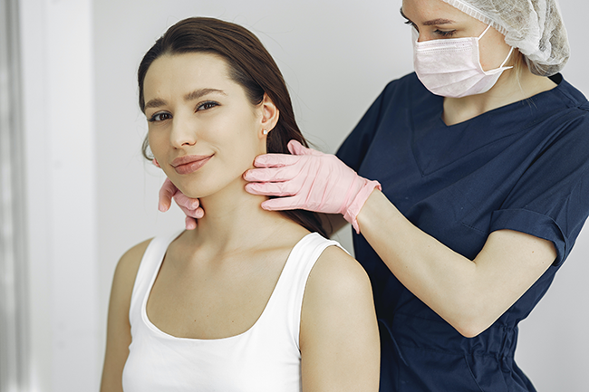 Nurse checking patient