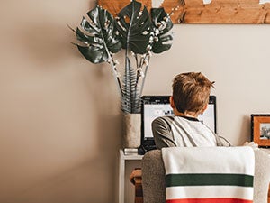 Young student on a computer for an online class